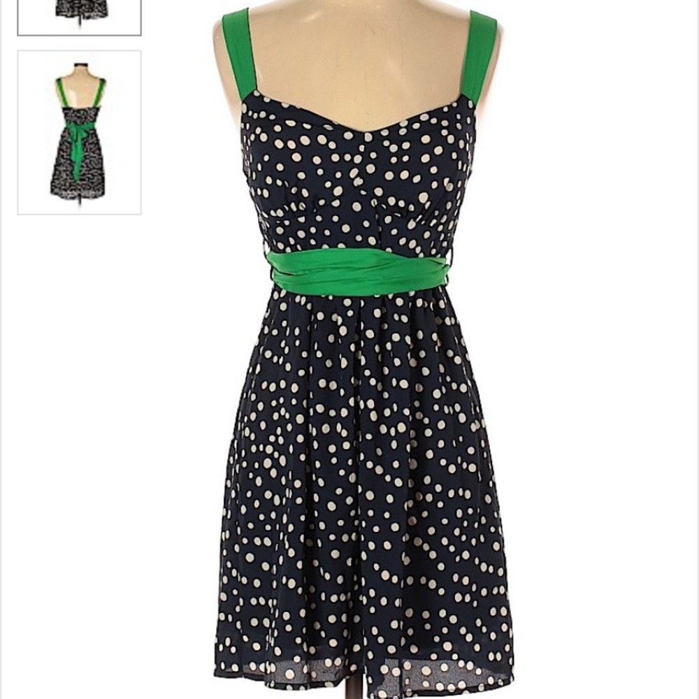 Polka dot dress with green sash